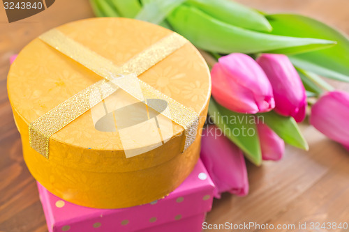 Image of present and tulips