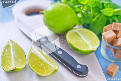 Image of fresh limes with sugar and mint