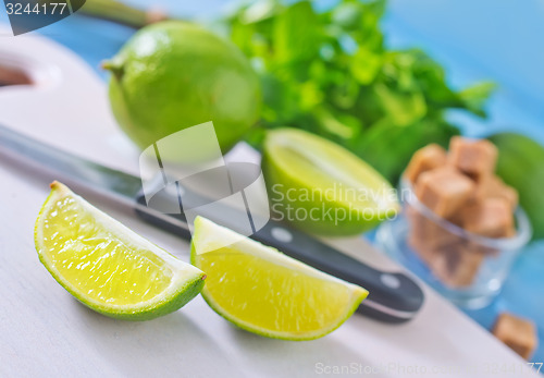 Image of fresh limes with sugar and mint