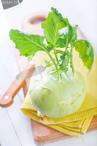 Image of Cabbage kohlrabi on Wooden Kitchen Board