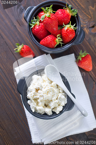 Image of cottage with strawberry