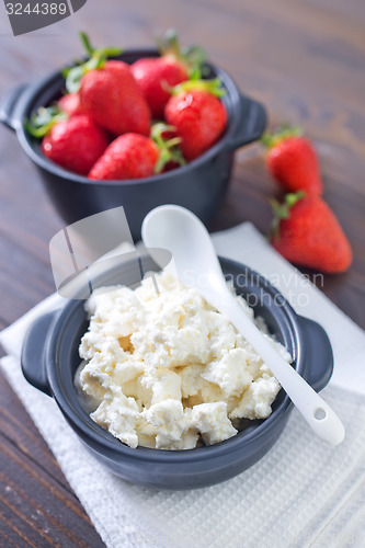 Image of cottage with strawberry