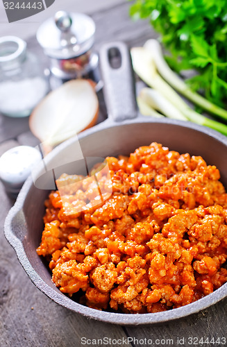 Image of minced meat with tomato sauce