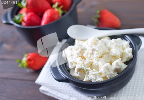 Image of cottage with strawberry