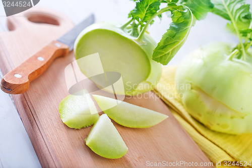 Image of Cabbage kohlrabi on Wooden Kitchen Board