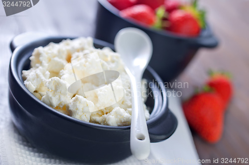 Image of cottage with strawberry