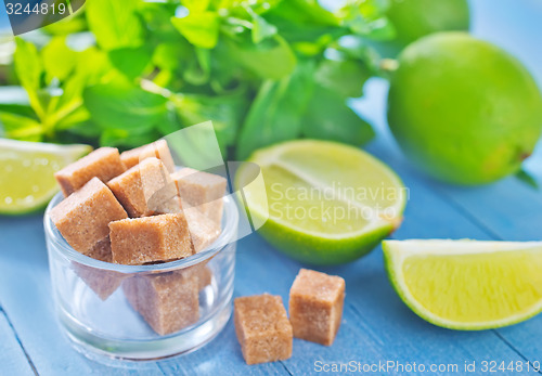 Image of fresh limes with sugar and mint