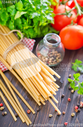 Image of raw pasta with tomato