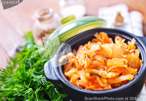 Image of fried cabbage with tomato sauce