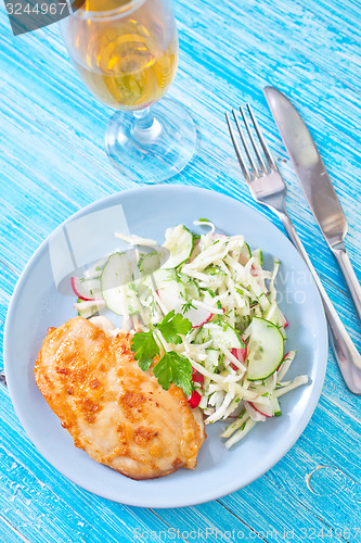 Image of chicken breast with salad