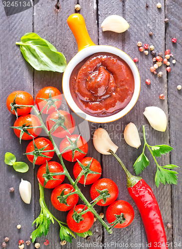 Image of tomato sauce and spice