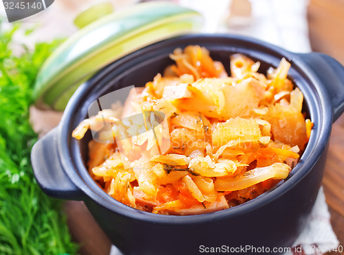 Image of fried cabbage with tomato sauce