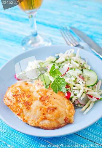 Image of chicken breast with salad