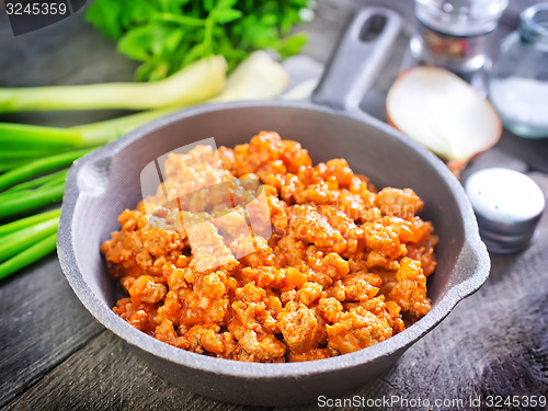 Image of minced meat with tomato sauce