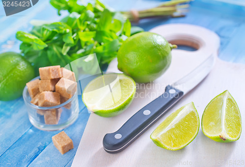 Image of fresh limes with sugar and mint