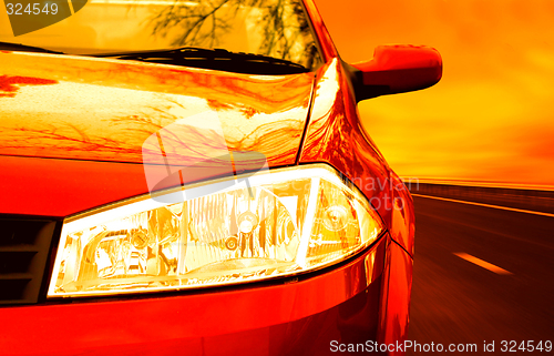 Image of Red Sport Car on a HighWay