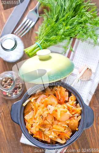 Image of fried cabbage with tomato sauce