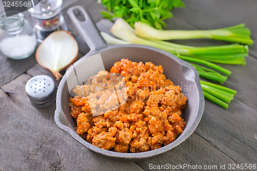 Image of minced meat with tomato sauce