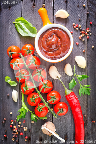 Image of tomato sauce and spice