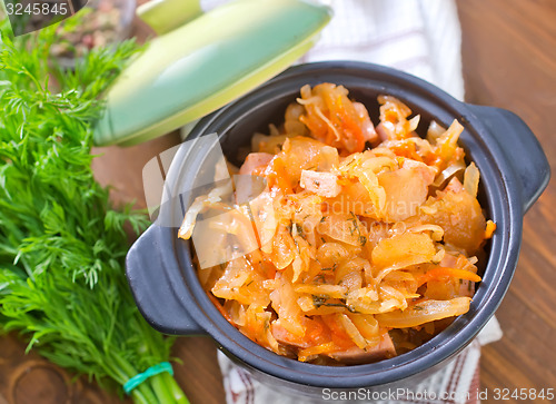 Image of fried cabbage with tomato sauce