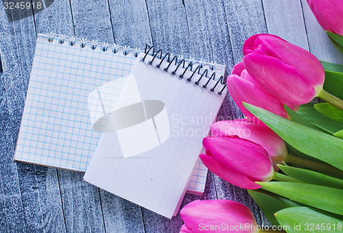 Image of flowers and note