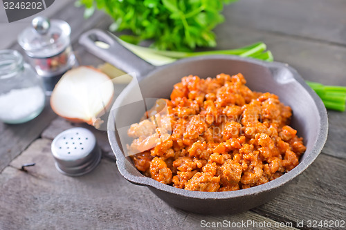 Image of minced meat with tomato sauce