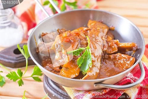 Image of fried meat with tomato sauce