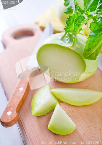 Image of Cabbage kohlrabi on Wooden Kitchen Board