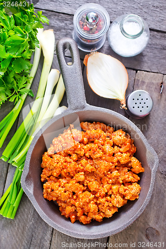 Image of minced meat with tomato sauce