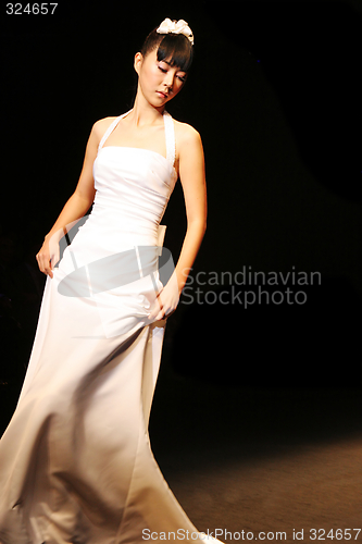 Image of Wedding dress model walking the catwalk at Seoul Collection (Fas