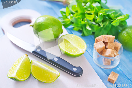 Image of fresh limes with sugar and mint