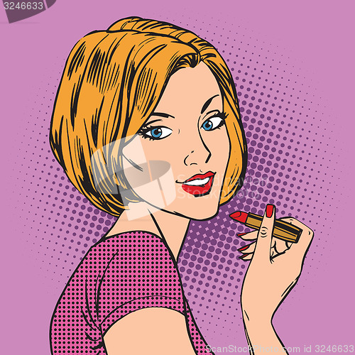 Image of Beautiful girl paints her lips red lipstick pop art comics retro