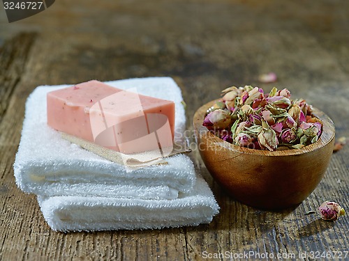 Image of white towels and natural rose soap bar