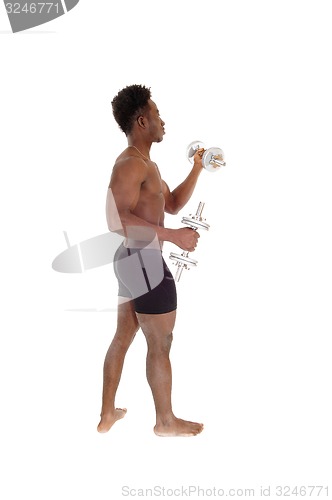 Image of Black man with dumbbell\'s.