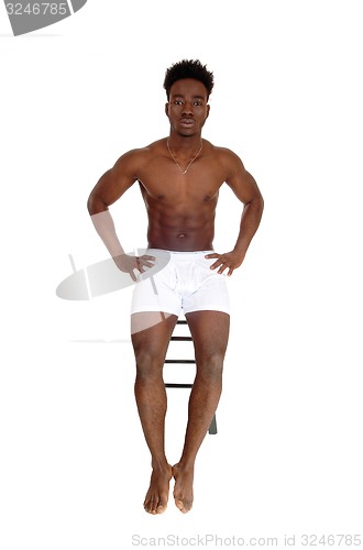 Image of Black man in white underwear.