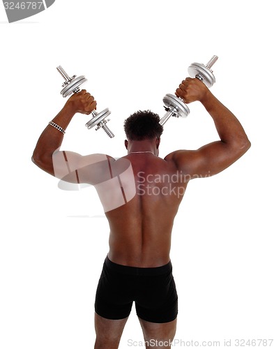 Image of Black man with dumbbells.