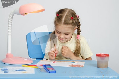 Image of Six year old girl on a drawing lesson