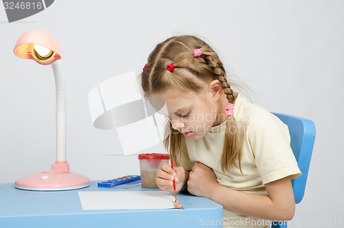 Image of Six year old girl keen on drawing