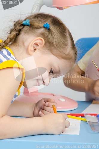 Image of Girl on a drawing lesson