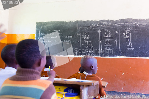 Image of School with school children at their desks.