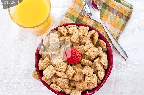 Image of Wheat Squares, Orange Juice and Bananas for Breakfast