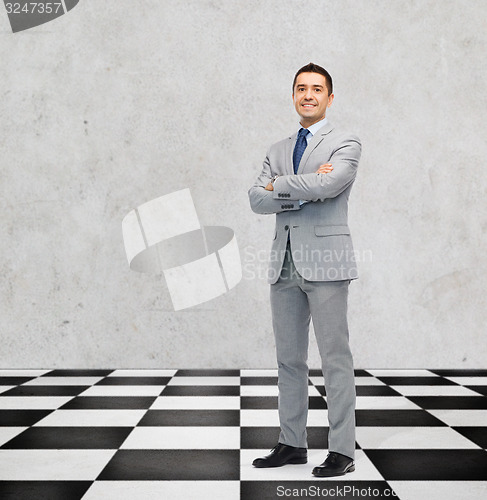 Image of happy smiling businessman in suit