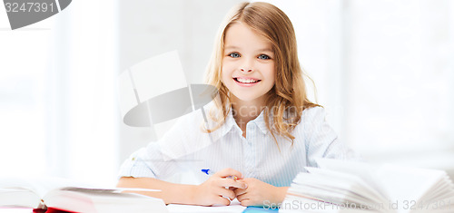 Image of student girl studying at school