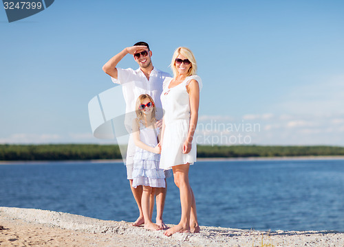 Image of happy family with blue sky