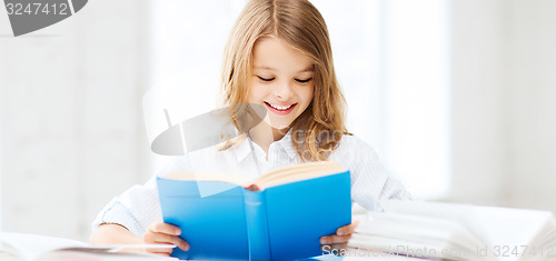 Image of student girl studying at school