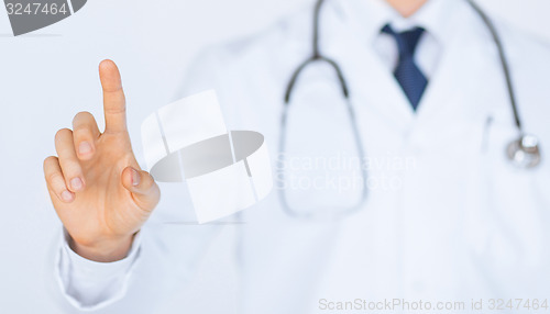 Image of doctor working with virtual screen