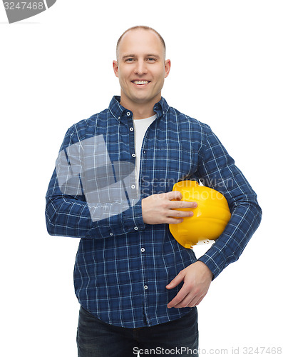 Image of smiling man in helmet with gloves