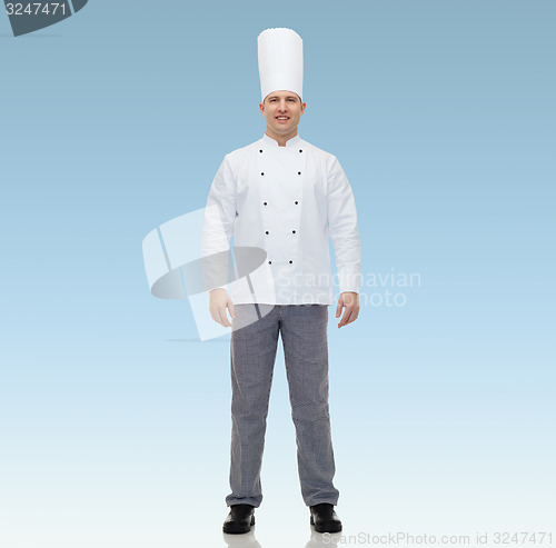 Image of happy male chef cook