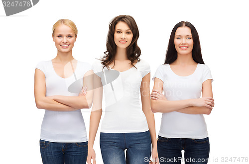 Image of group of smiling women in blank white t-shirts
