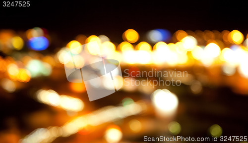 Image of golden bright lights on dark night background